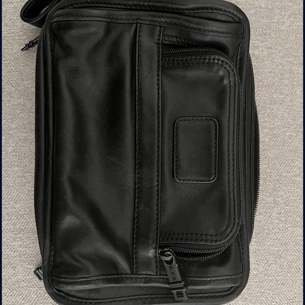 Tumi leather hand bag